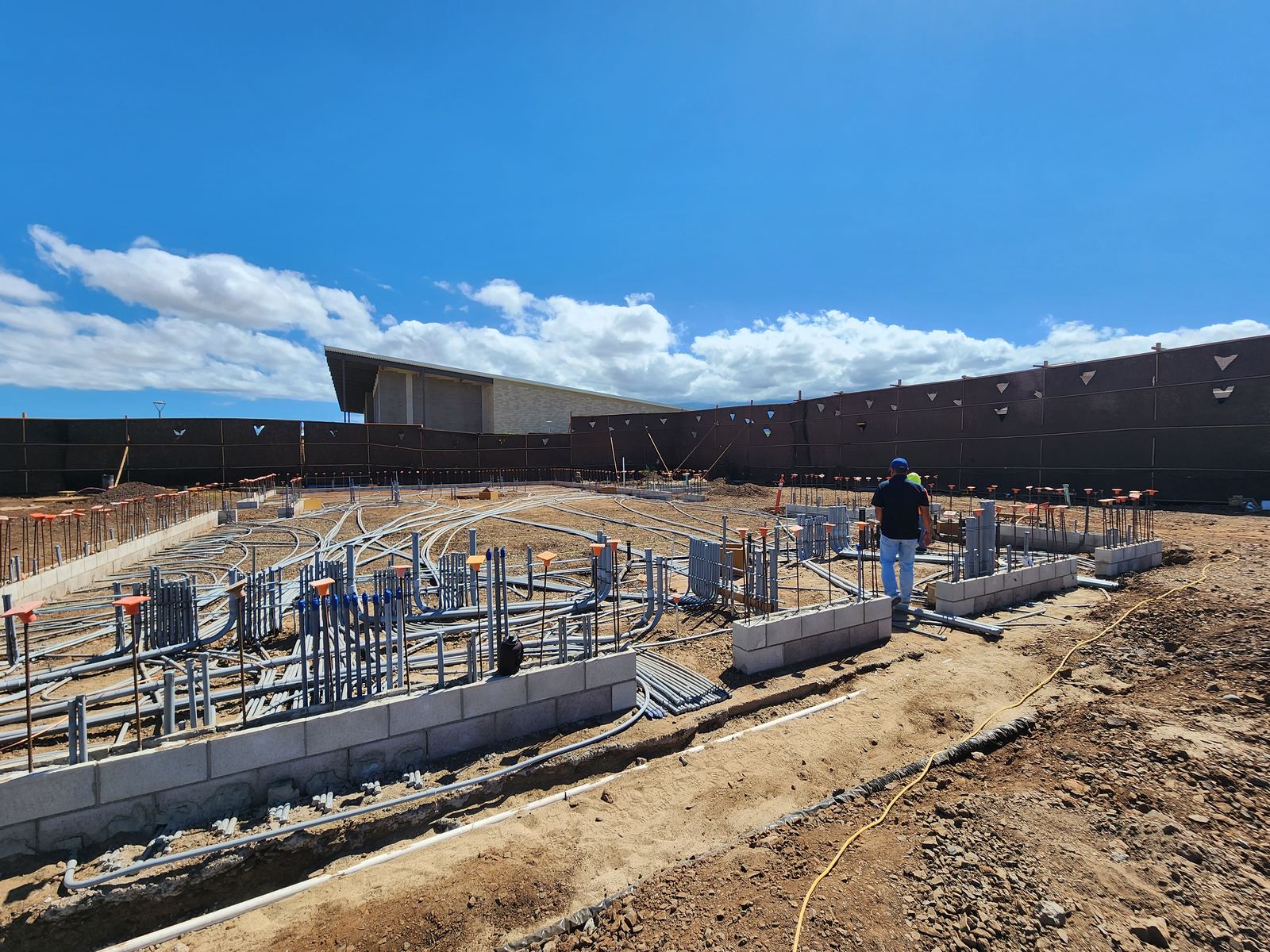 Large commercial site with underground electrical conduit and foundations